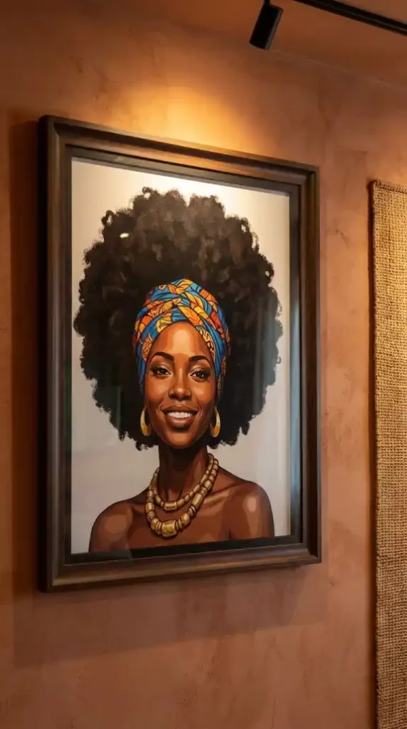 Large-Afro-Queen-portrait-in-dark-wood-frame-on-terracotta-plaster-wall