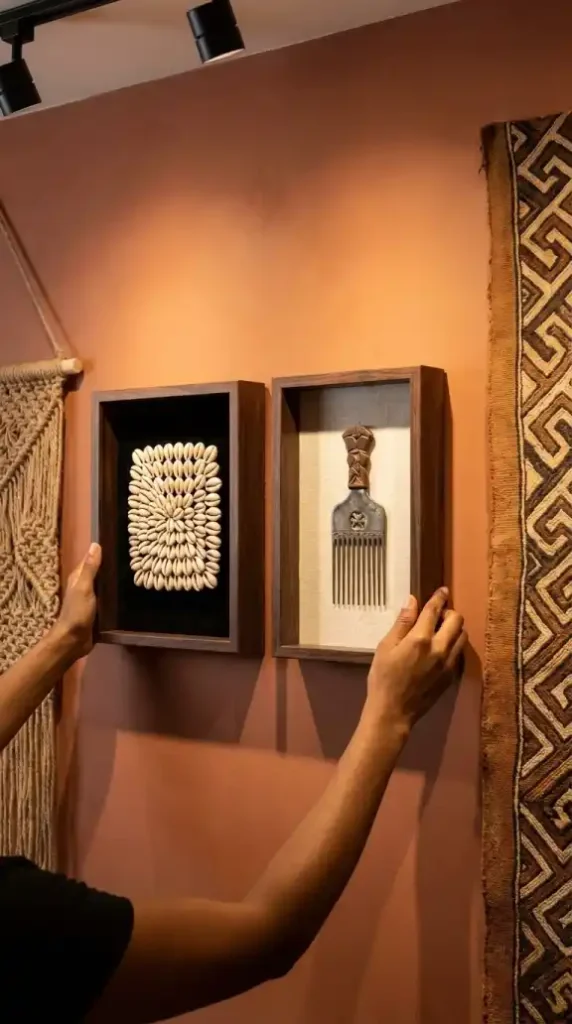 Cowrie-shell-and-Afro-pick-shadow-boxes-at-gallery-detail-zone